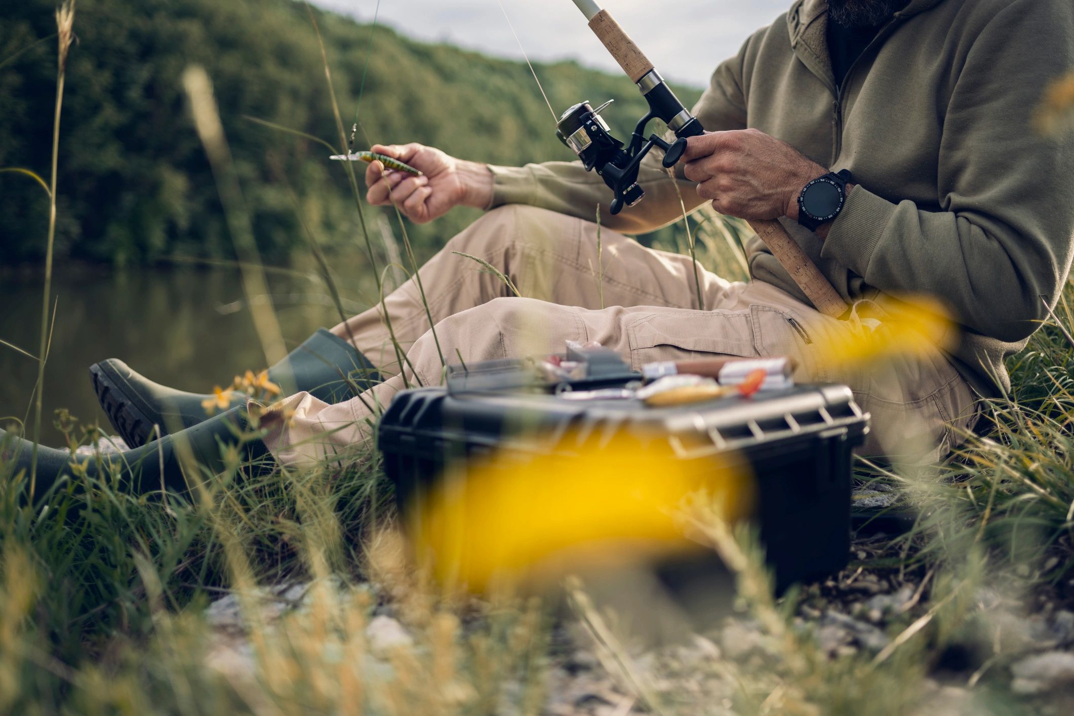 Angler preparing fishing gear